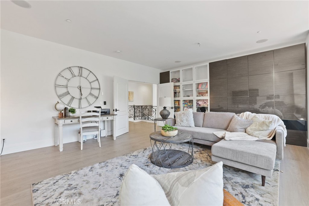 2 Olympic Way Coto de Caza, CA 92679 - Photo 43 of 75 a living room with furniture a rug and a large window