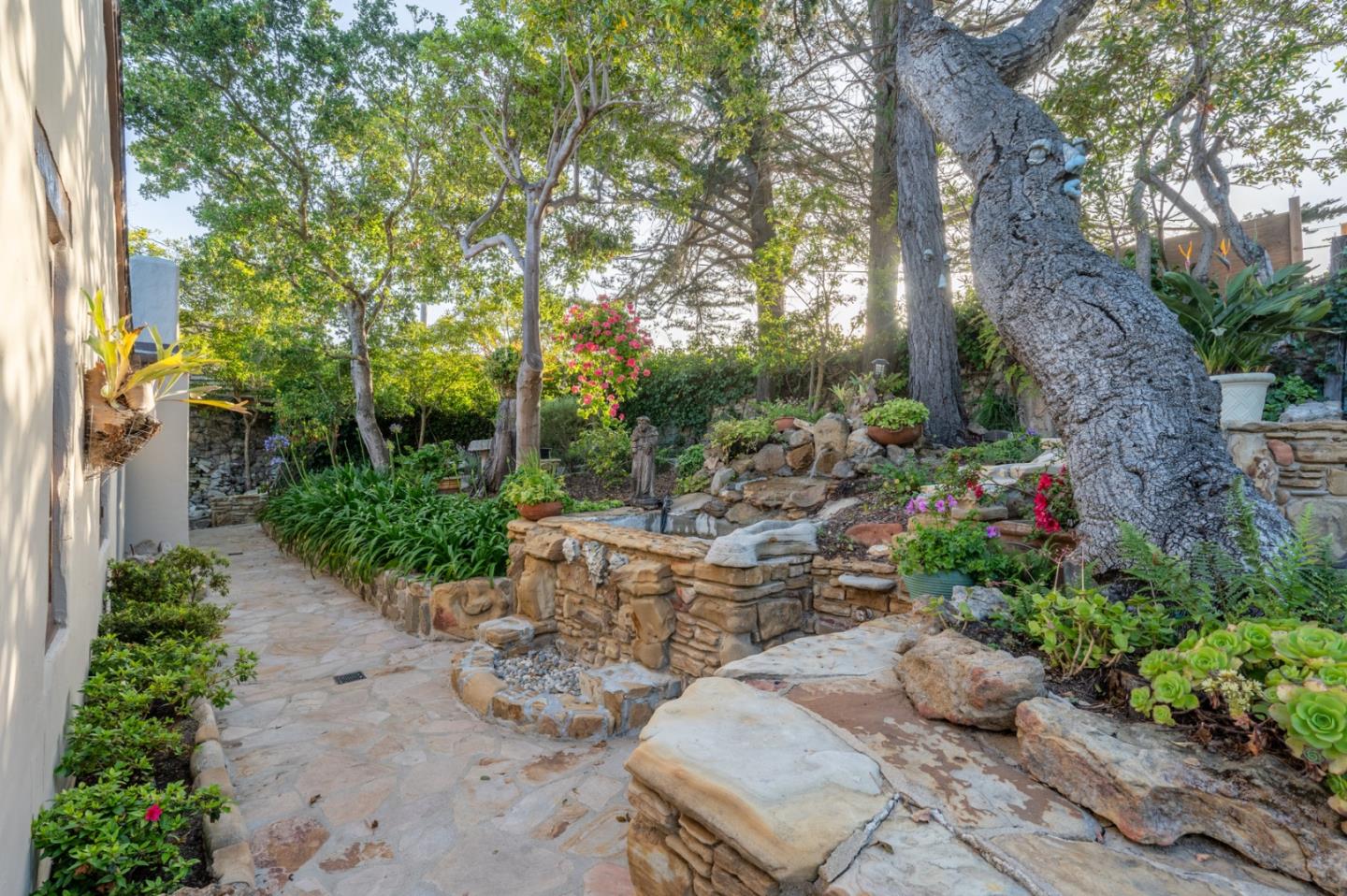 151 Highlands Drive Carmel, CA 93923 - Photo 25 of 31 a garden with lots of trees and flowers