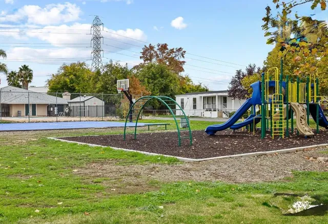 a view of a house with a park