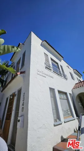 a view of a building with entryway and hallway