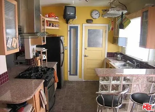 a view of balcony with furniture