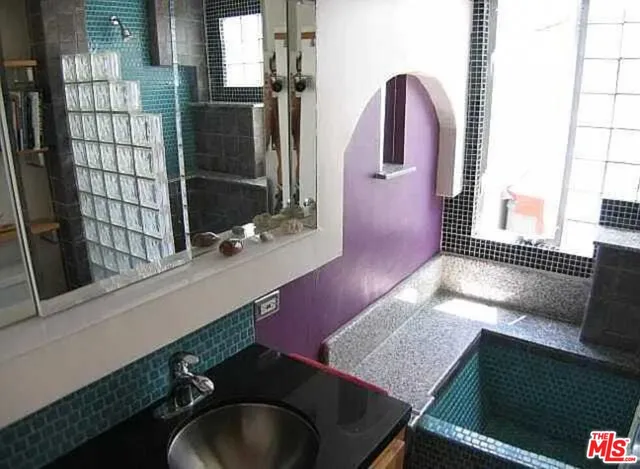 a dining room with table and chairs