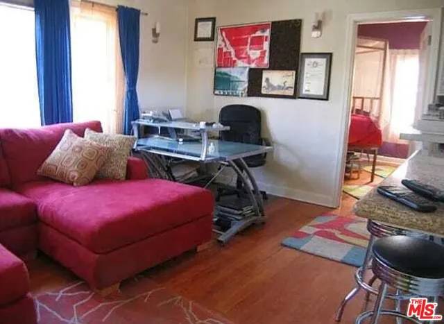 a kitchen with granite countertop a sink and a stove