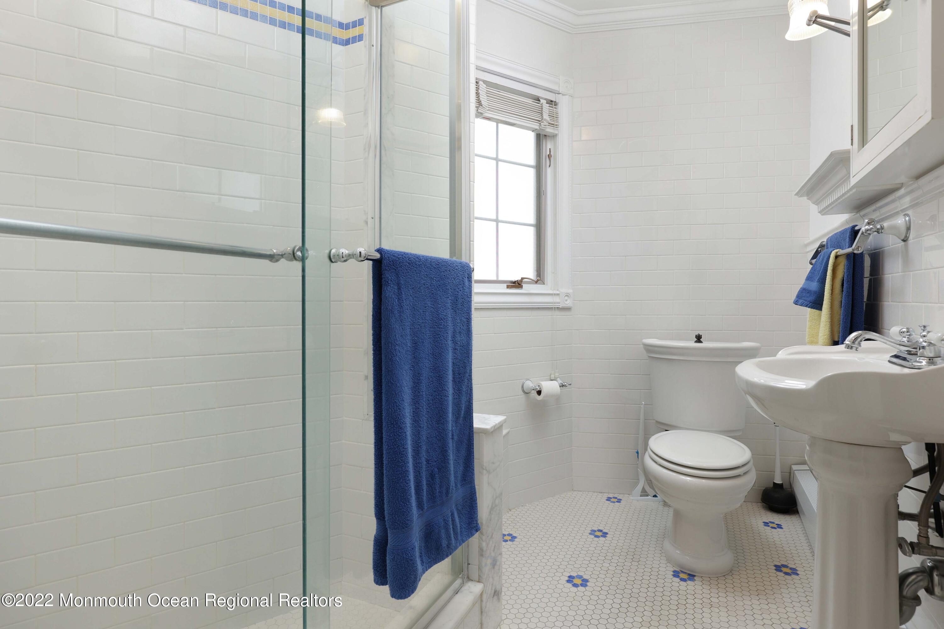 68 C West Front Street Red Bank, NJ 07701 - Photo 17 of 41 a bathroom with a toilet and a sink