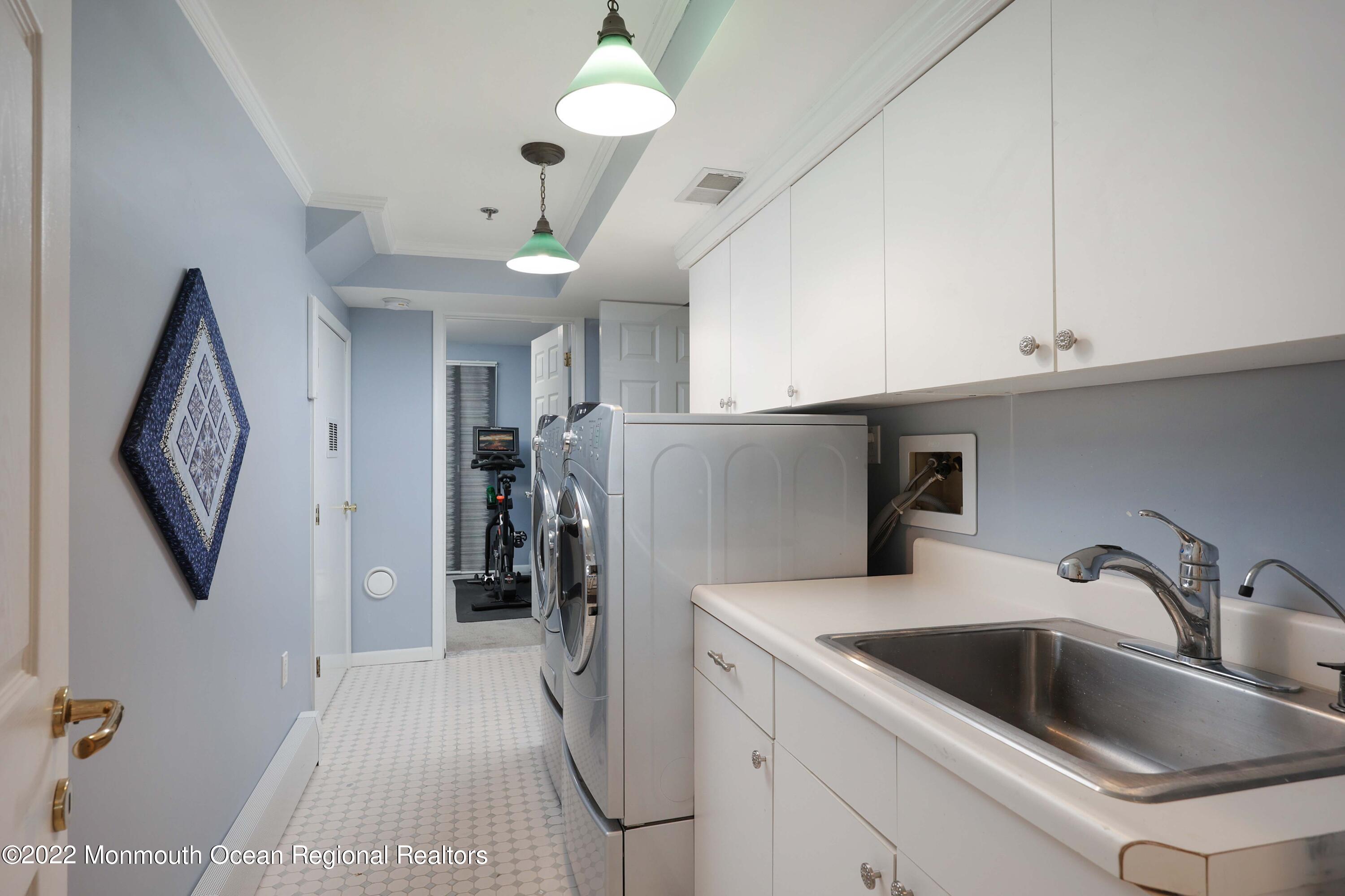 68 C West Front Street Red Bank, NJ 07701 - Photo 23 of 41 a kitchen with a refrigerator sink and cabinets