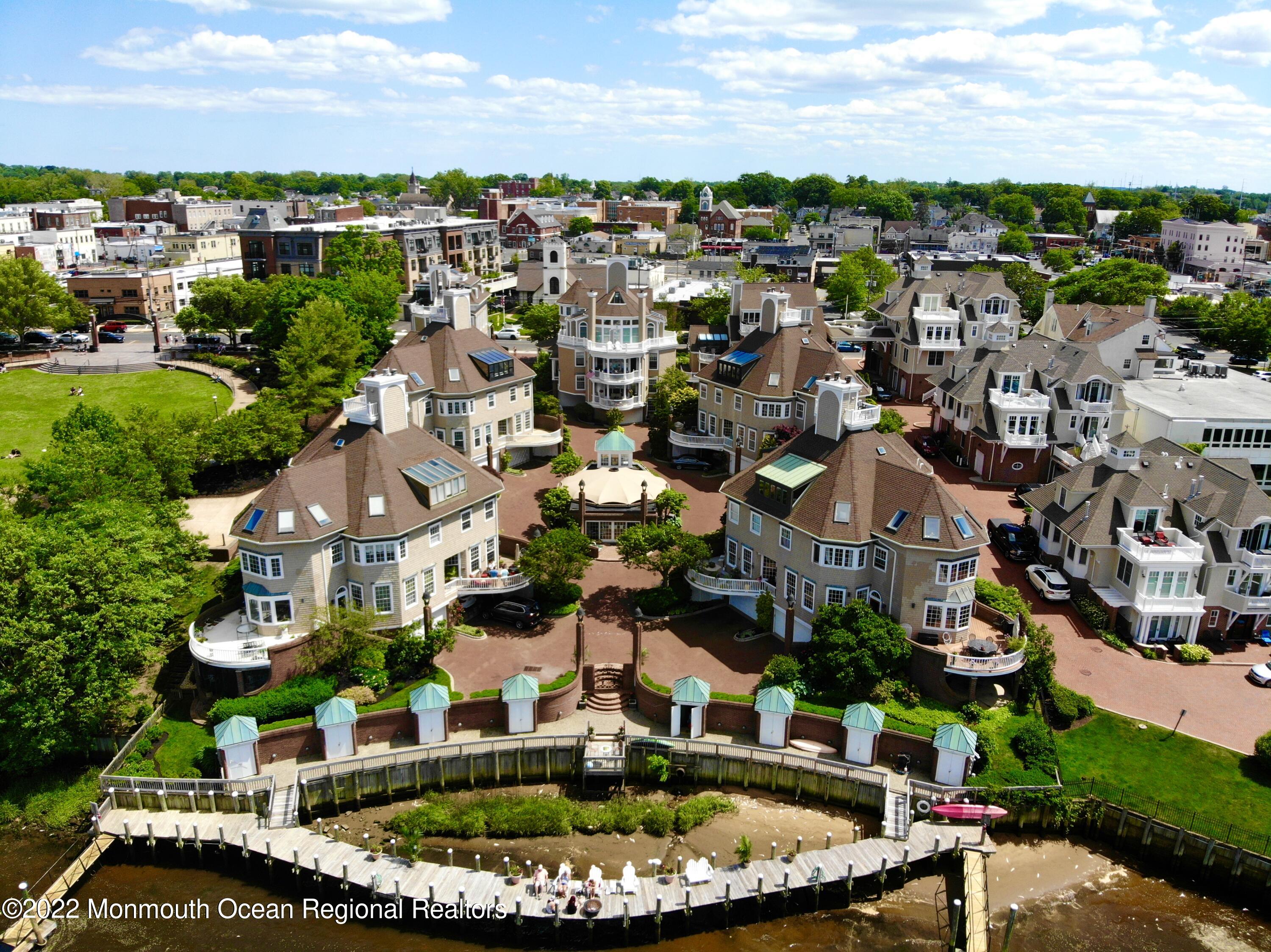68 C West Front Street Red Bank, NJ 07701 - Photo 37 of 41 an aerial view of a house with a garden and lake view