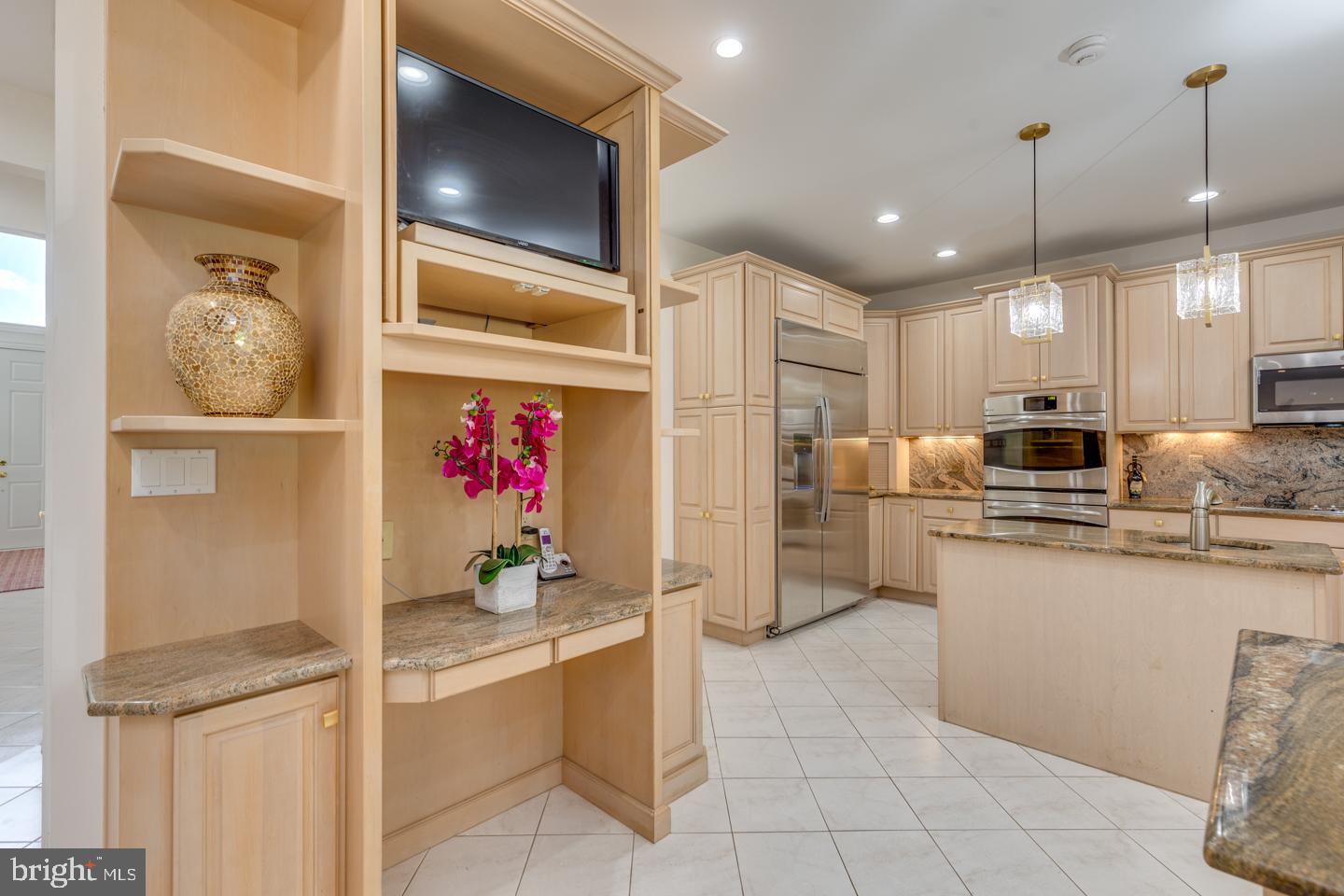 2 Collage Court Cherry Hill, NJ 08003 - Photo 16 of 89 a kitchen with stainless steel appliances kitchen island granite countertop a refrigerator and microwave