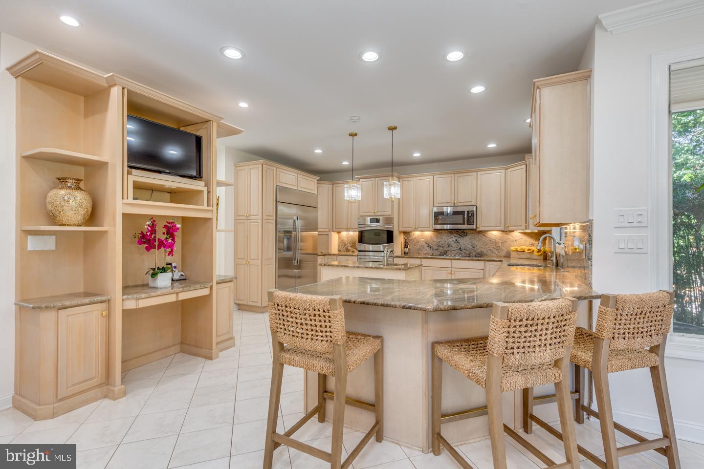 2 Collage Court Cherry Hill, NJ 08003 - Photo 18 of 89 a kitchen with stainless steel appliances kitchen island granite countertop a sink and cabinets