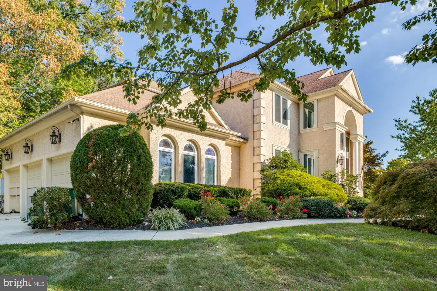 2 Collage Court Cherry Hill, NJ 08003 - Photo 2 of 89 a front view of a house with a garden