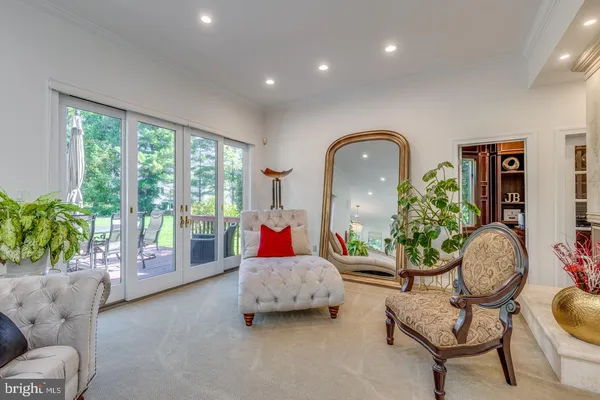 a bathroom with a toilet a sink and a mirror