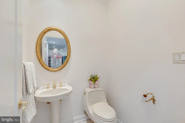 a bathroom with a sink a large mirror and a shower
