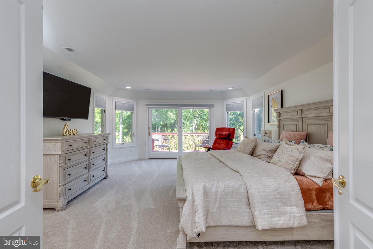 2 Collage Court Cherry Hill, NJ 08003 - Photo 37 of 89 a bedroom with a bed and flat screen tv