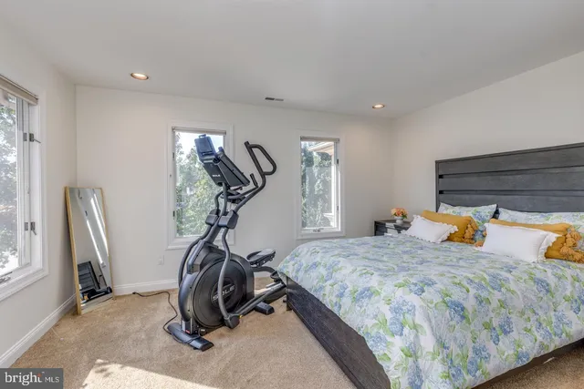 a view of a house with a yard porch and sitting area