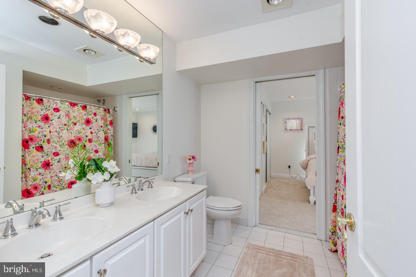 2 Collage Court Cherry Hill, NJ 08003 - Photo 56 of 89 a bathroom with a sink a large mirror and a shower