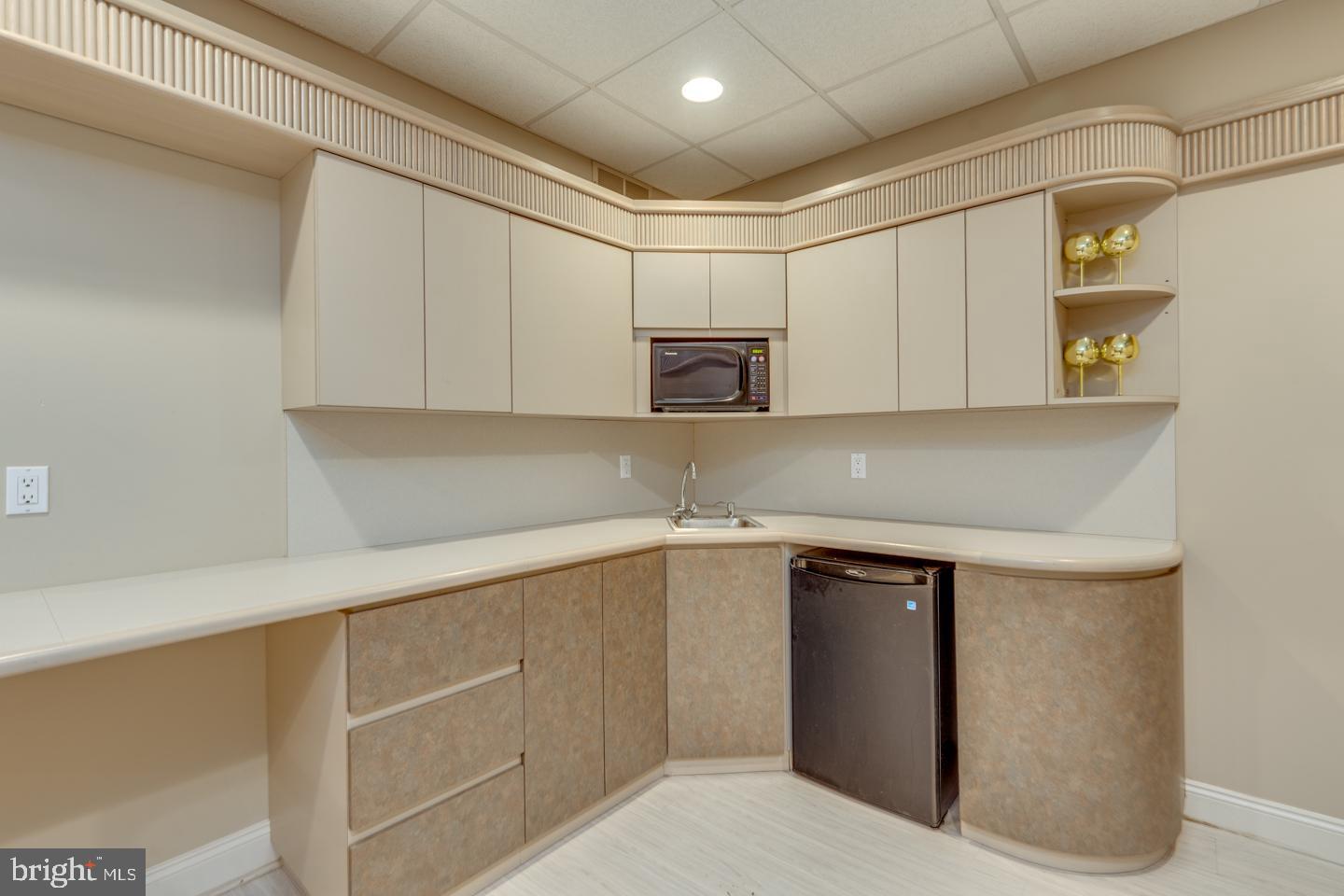 2 Collage Court Cherry Hill, NJ 08003 - Photo 66 of 89 a kitchen with cabinets appliances a sink and a counter top space