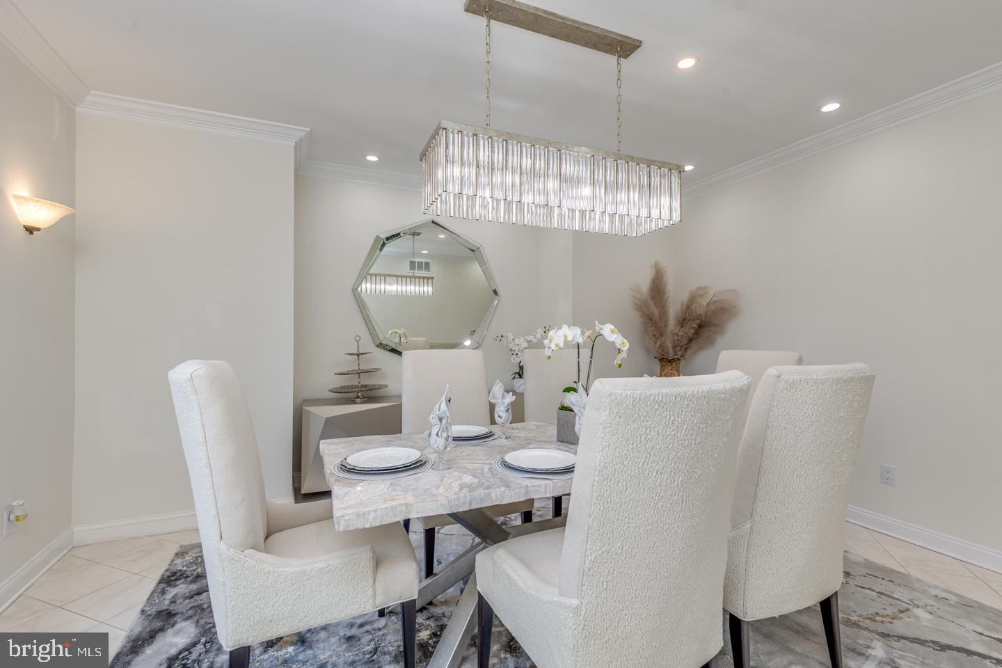 2 Collage Court Cherry Hill, NJ 08003 - Photo 9 of 89 a view of a dining room with furniture wooden floor and chandelier