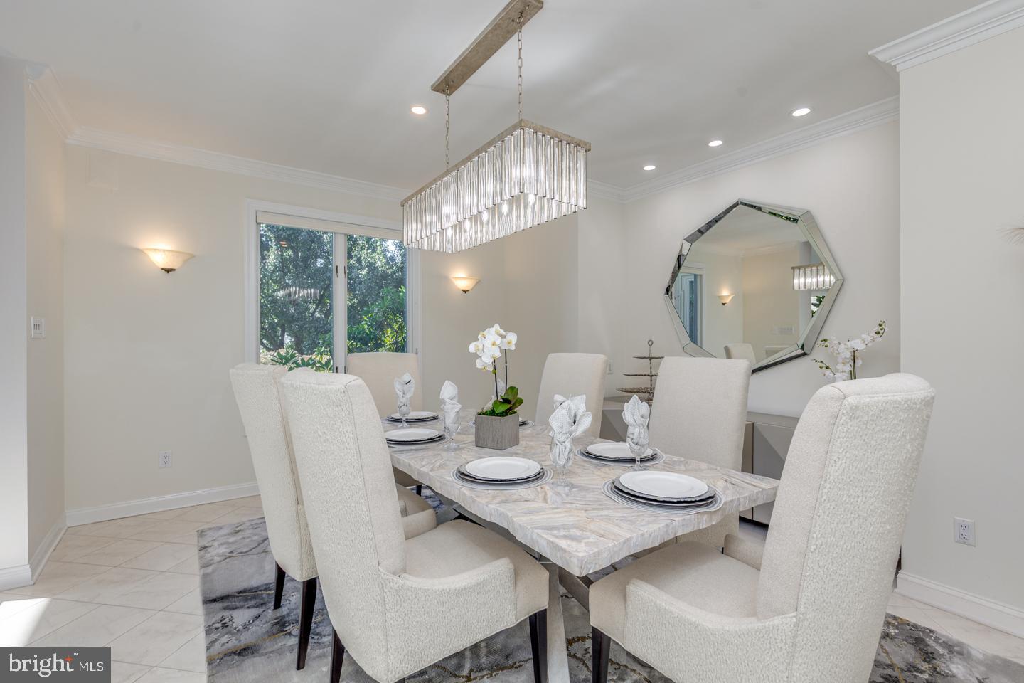2 Collage Court Cherry Hill, NJ 08003 - Photo 10 of 89 a view of a dining room with furniture and chandelier