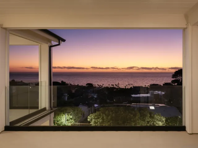 a view of a lake from a balcony