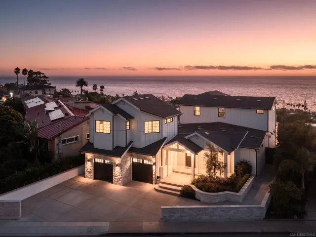 an aerial view of a house with a garden