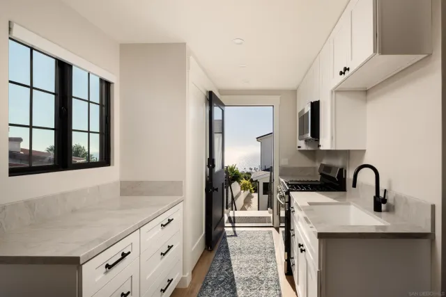 a view of a water fountain and a bench in it