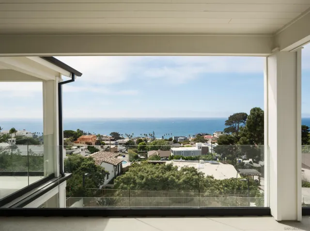 a view of a lake with a building in the background