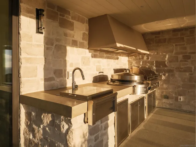 an aerial view of a houses with outdoor space