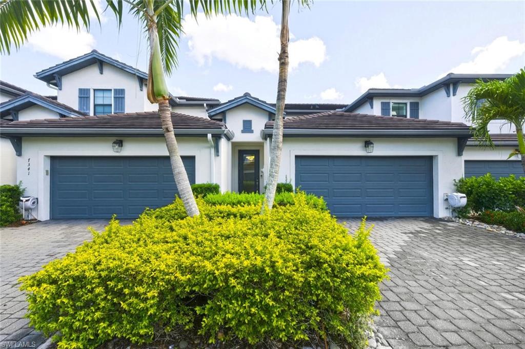 7345 Rockefeller Drive Naples, FL 34119 - Photo 3 of 42 Front, 2-car garage