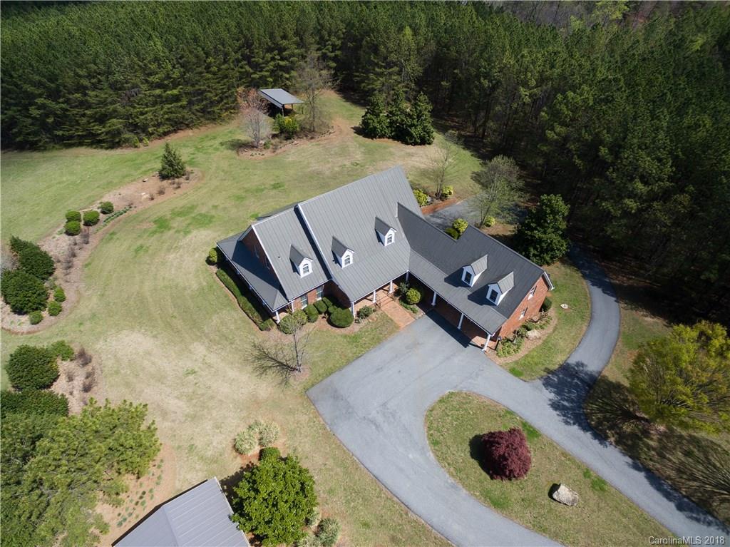 484 Pierce Road Landrum, SC 29356 - Photo 1 of 35 an aerial view of a house with outdoor space