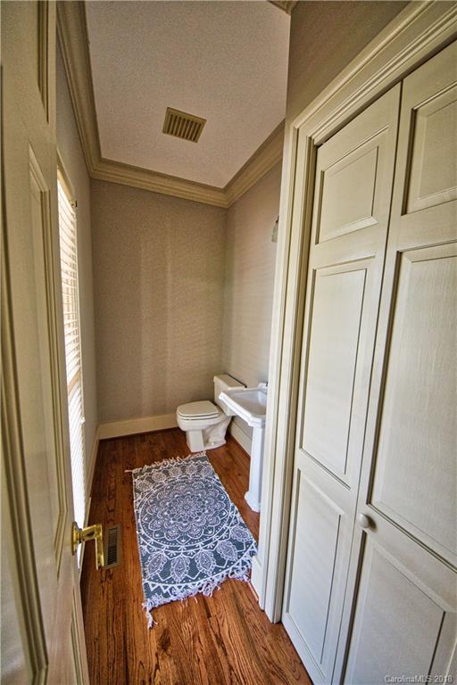 484 Pierce Road Landrum, SC 29356 - Photo 15 of 35 a bathroom with a sink and toilet