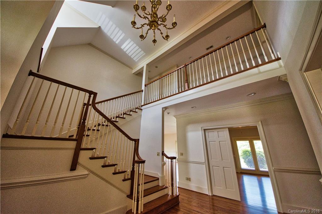 484 Pierce Road Landrum, SC 29356 - Photo 3 of 35 a view of staircase with railing and white walls