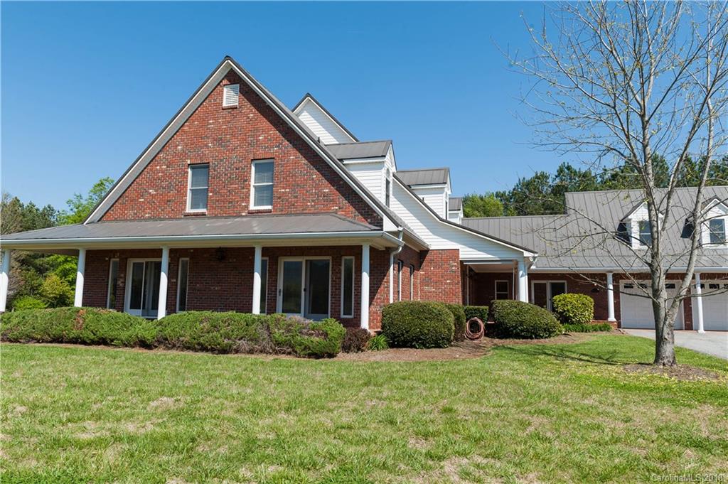 484 Pierce Road Landrum, SC 29356 - Photo 29 of 35 a front view of a house with a yard