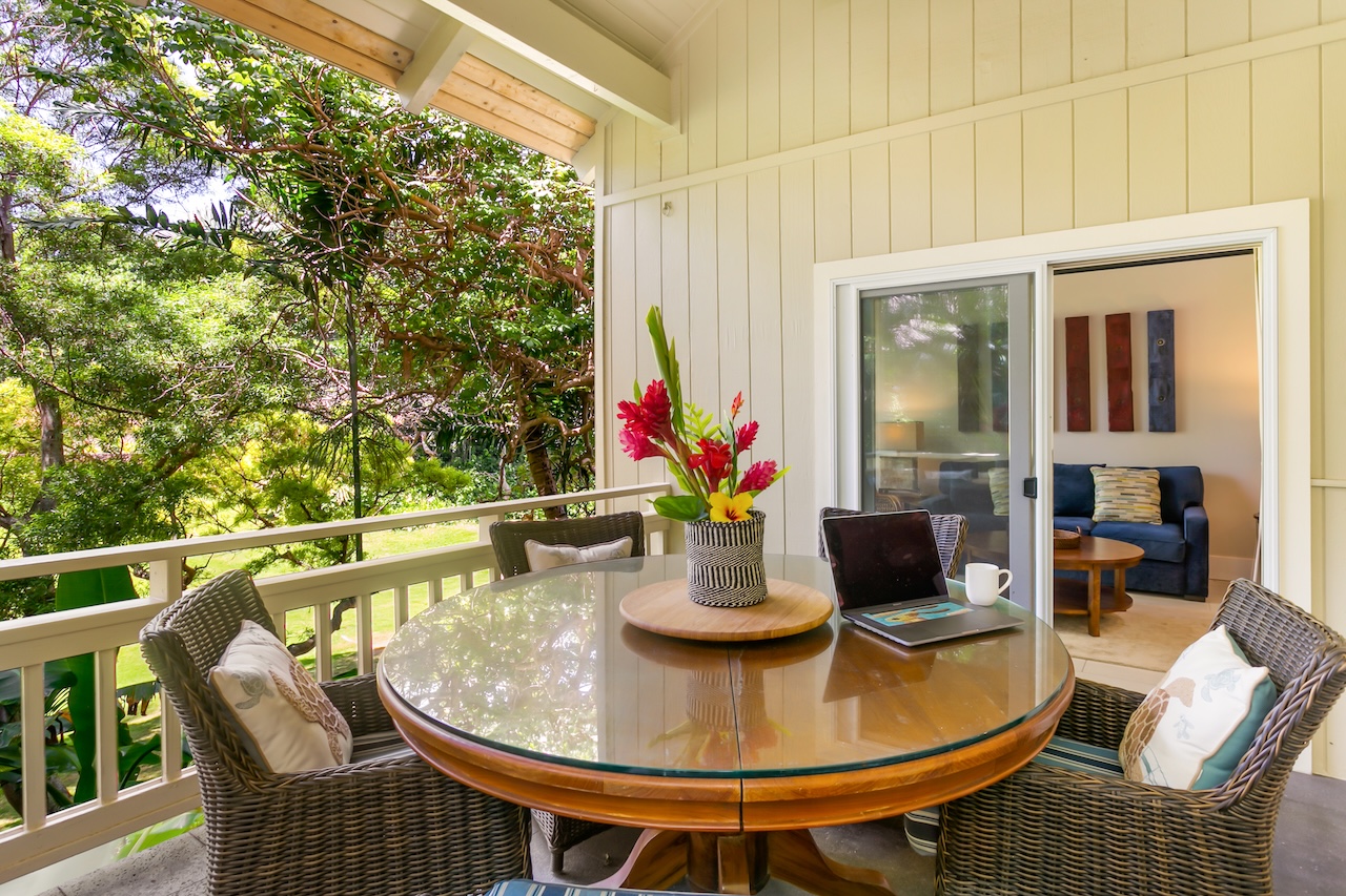 2330 Ho'ohu Road, Unit 16 Koloa, HI 96756 - Photo 11 of 29 a outdoor dining space with furniture and wooden floor