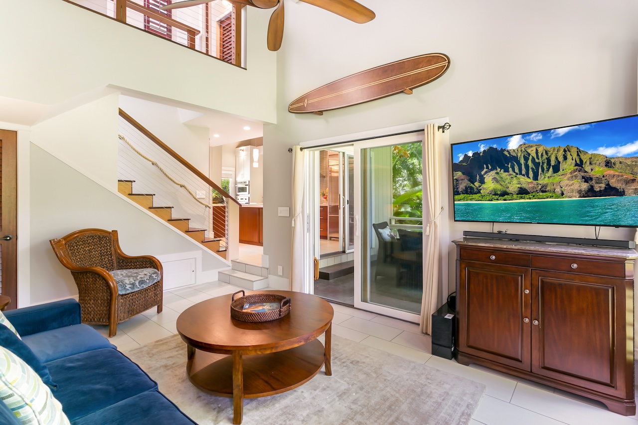 2330 Ho'ohu Road, Unit 16 Koloa, HI 96756 - Photo 13 of 29 a living room with furniture and a wooden floor