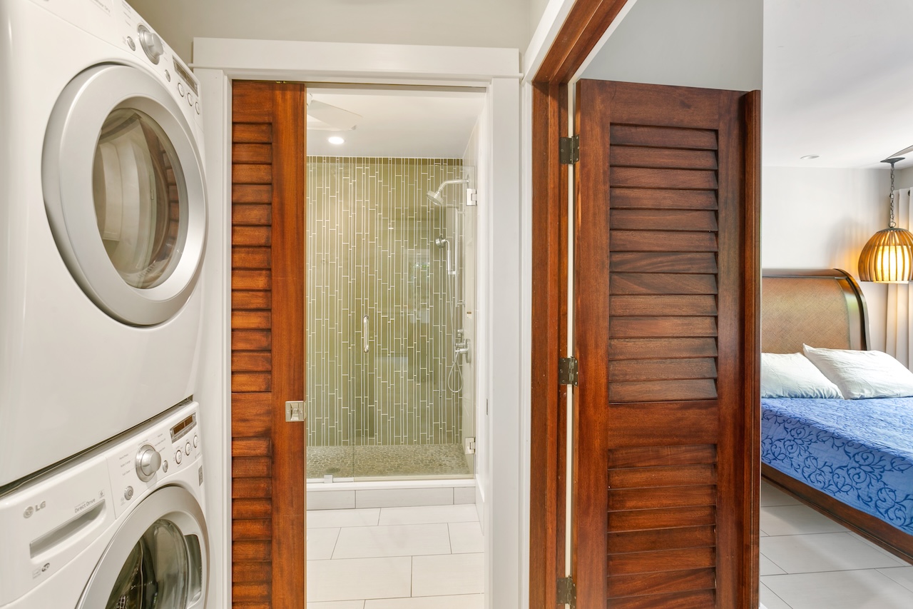 2330 Ho'ohu Road, Unit 16 Koloa, HI 96756 - Photo 17 of 29 a view of a bedroom with washer and dryer