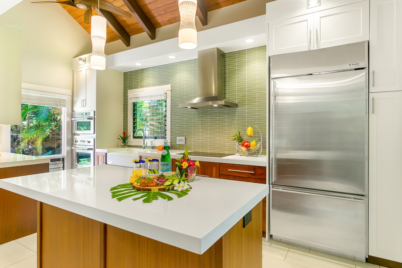 2330 Ho'ohu Road, Unit 16 Koloa, HI 96756 - Photo 2 of 29 a kitchen with a refrigerator and countertop