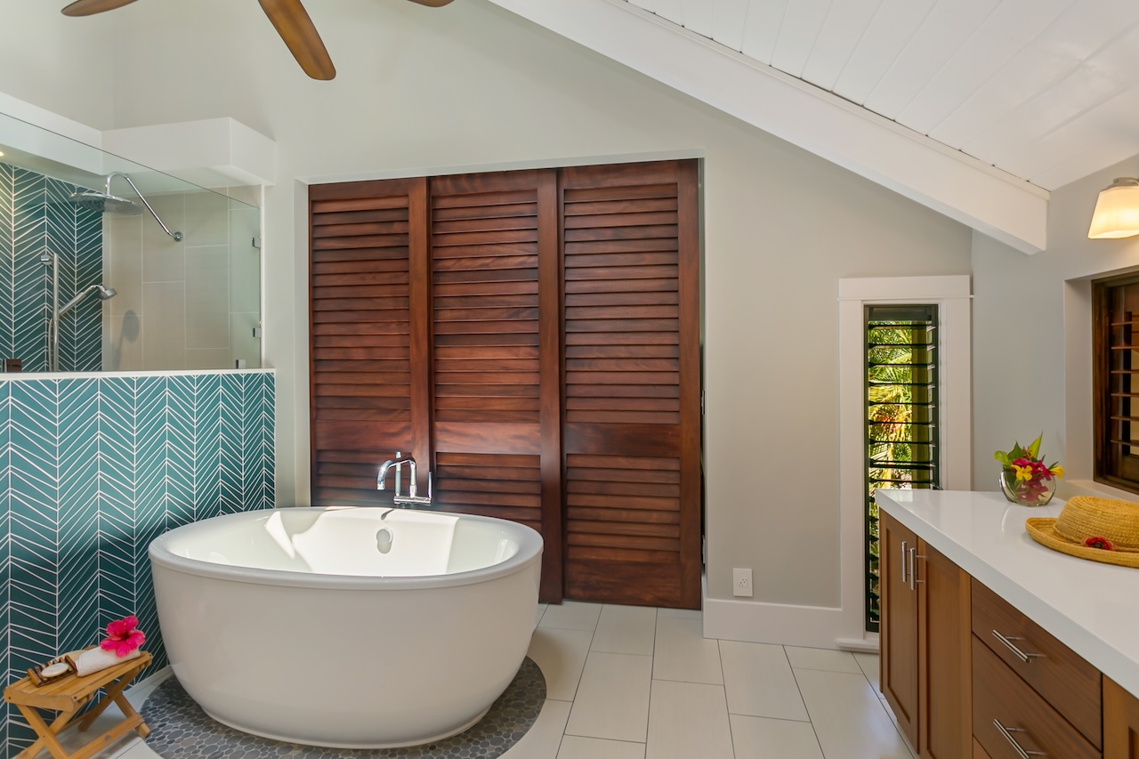 2330 Ho'ohu Road, Unit 16 Koloa, HI 96756 - Photo 24 of 29 a bathroom with a bathtub and shower