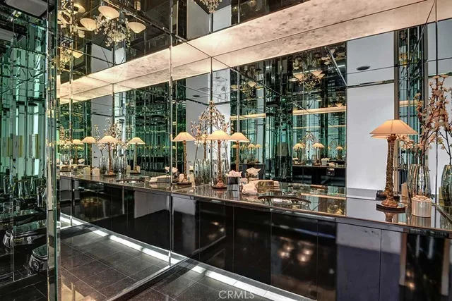 a kitchen with a sink and wooden cabinets