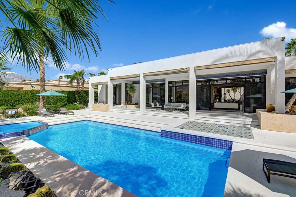 70955 Tamarisk Lane Rancho Mirage, CA 92270 - Photo 39 of 42 a view of house with swimming pool and porch