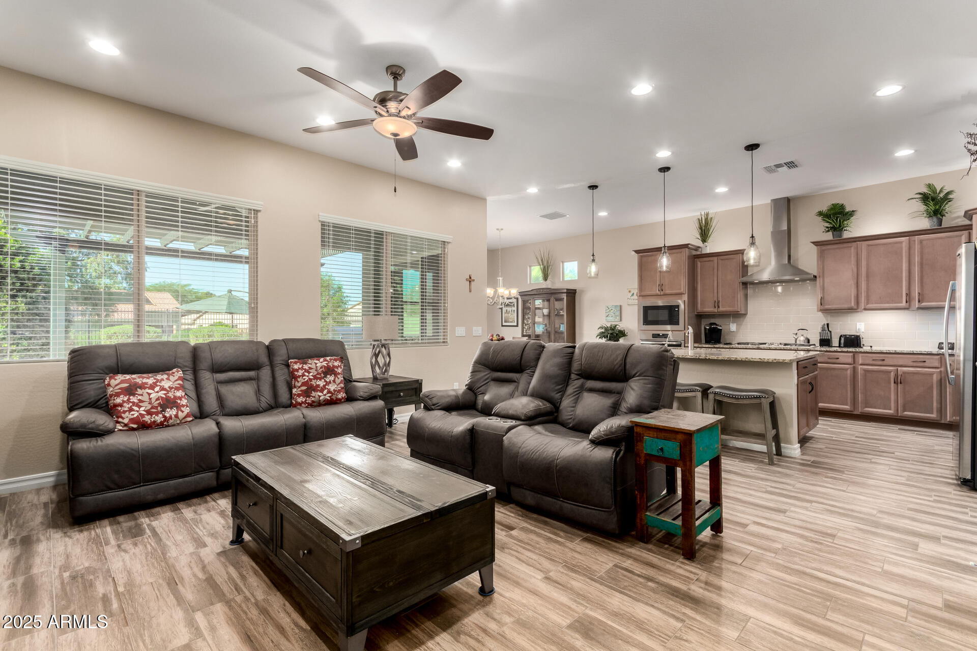 18190 North Stonegate Road Maricopa, AZ 85138 - Photo 1 of 27 a living room with furniture and a large window