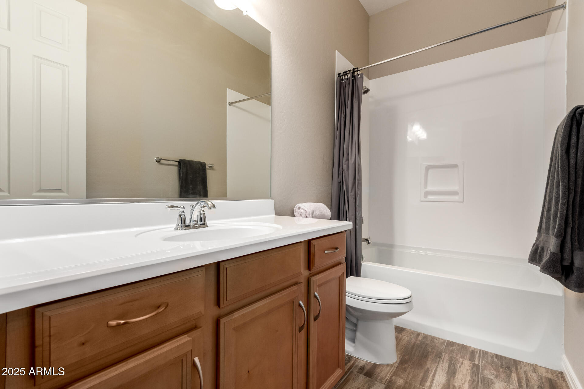 18190 North Stonegate Road Maricopa, AZ 85138 - Photo 15 of 27 a bathroom with a sink a toilet and shower