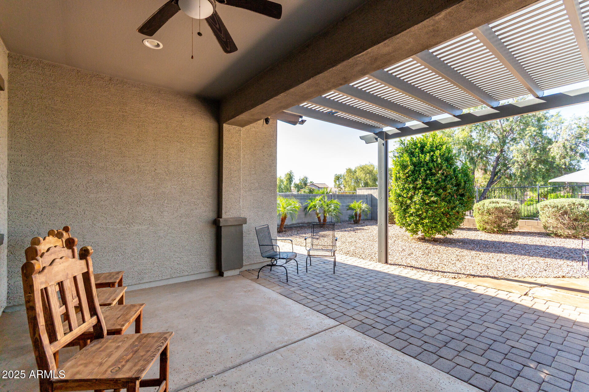 18190 North Stonegate Road Maricopa, AZ 85138 - Photo 19 of 27 a living room with furniture and a large window