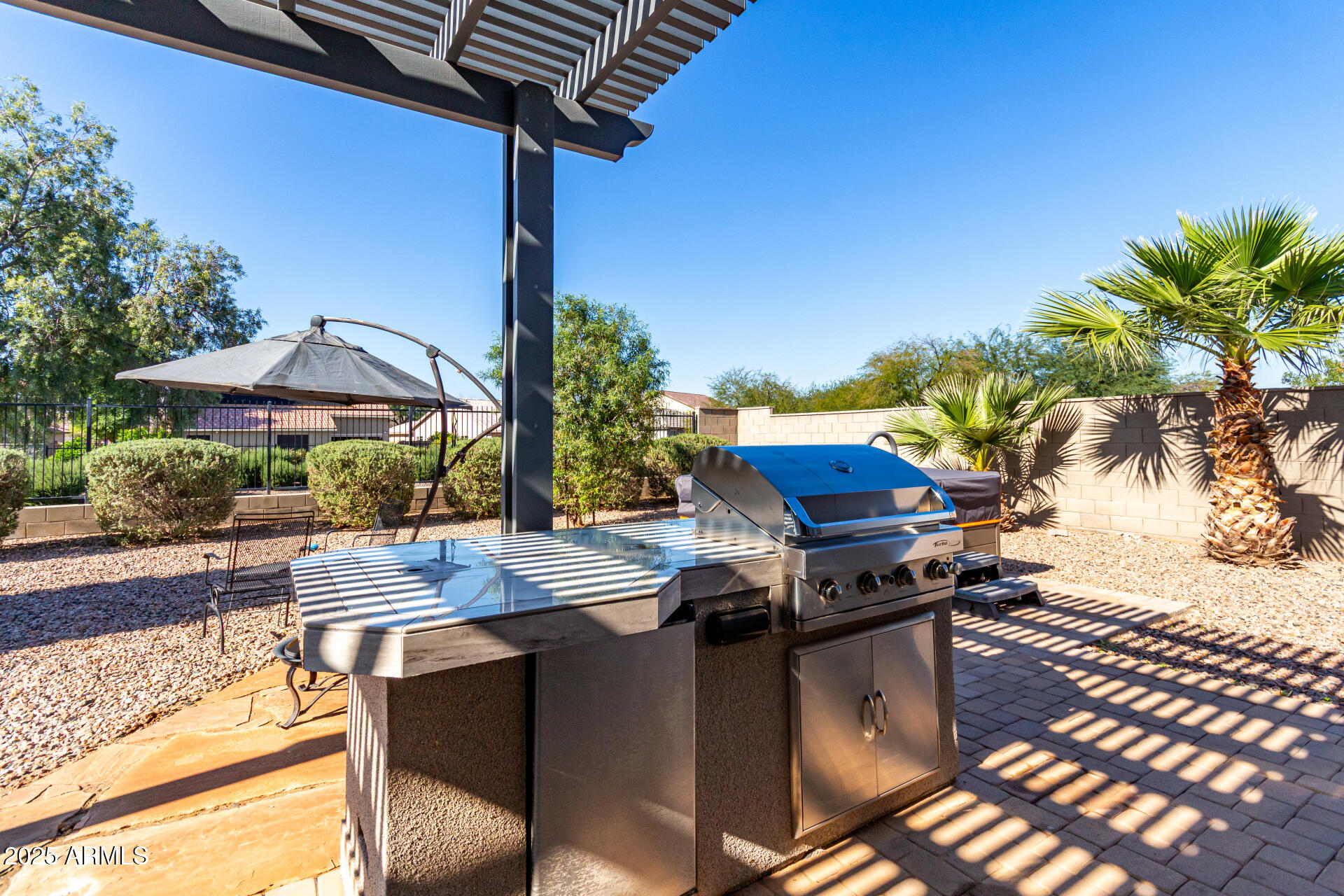 18190 North Stonegate Road Maricopa, AZ 85138 - Photo 24 of 27 a view of outdoor kitchen with seating space