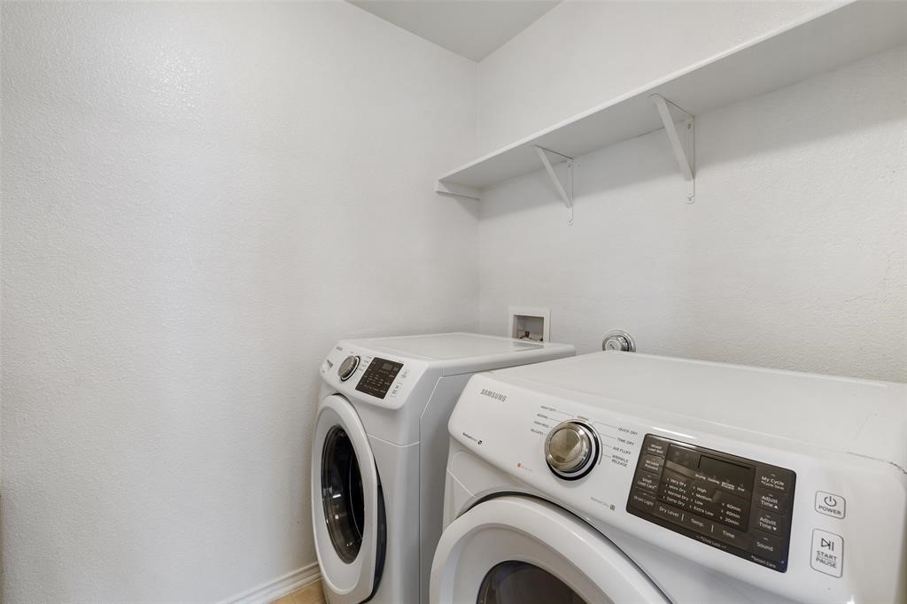 517 Castebar Drive Round Rock, TX 78664 - Photo 26 of 37 a utility room with dryer and washer