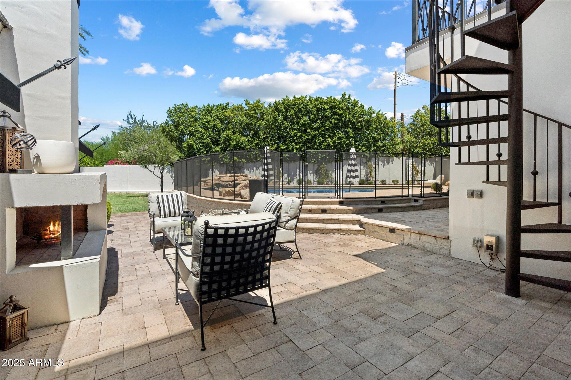 4502 East Exeter Boulevard Phoenix, AZ 85018 - Photo 35 of 48 Courtyard Patio with Fireplace