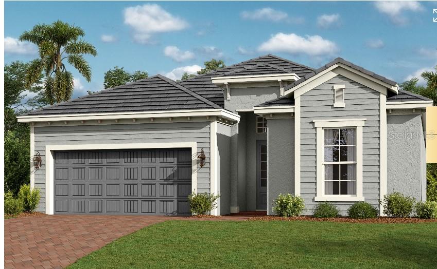 a front view of a house with a garden and plants