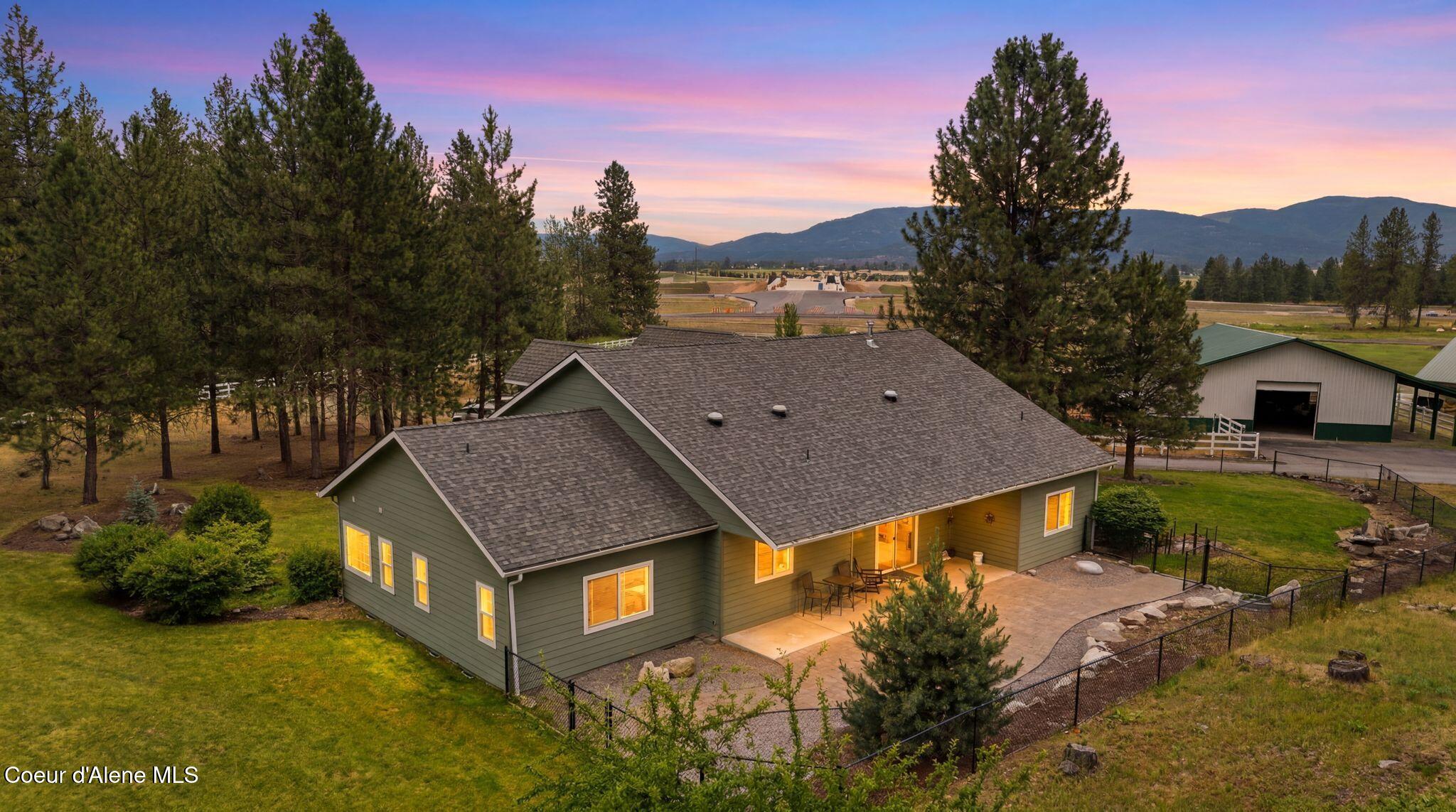8964 Hauser Lake Road Hauser, ID 83854 - Photo 2 of 89 64_DJI_20260626140326_0900_D_twilight_90