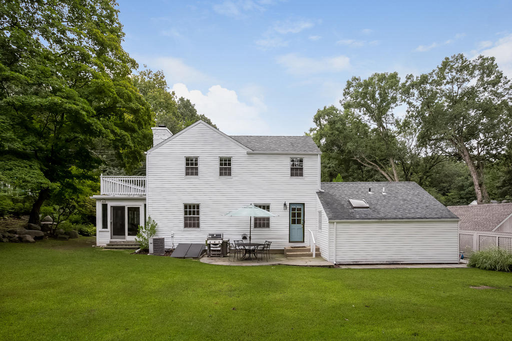 39 Intervale Road Darien, CT 06820 - Photo 13 of 18 a view of a house with a yard and sitting area