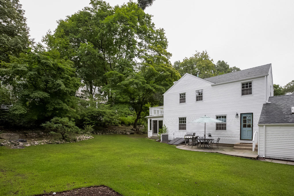 39 Intervale Road Darien, CT 06820 - Photo 14 of 18 a view of a house with backyard and sitting area