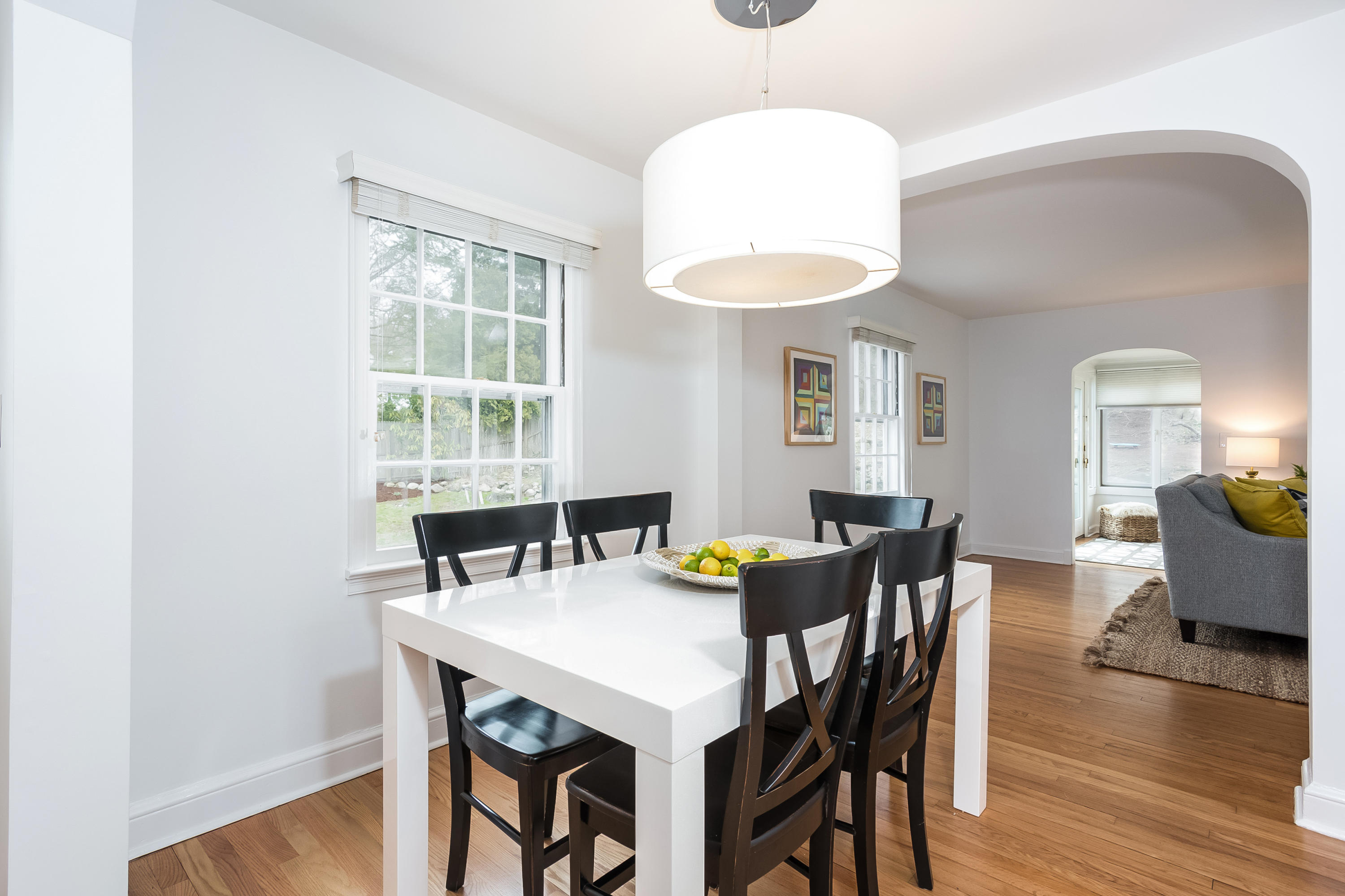 39 Intervale Road Darien, CT 06820 - Photo 6 of 18 a view of a dining room with furniture and wooden floor