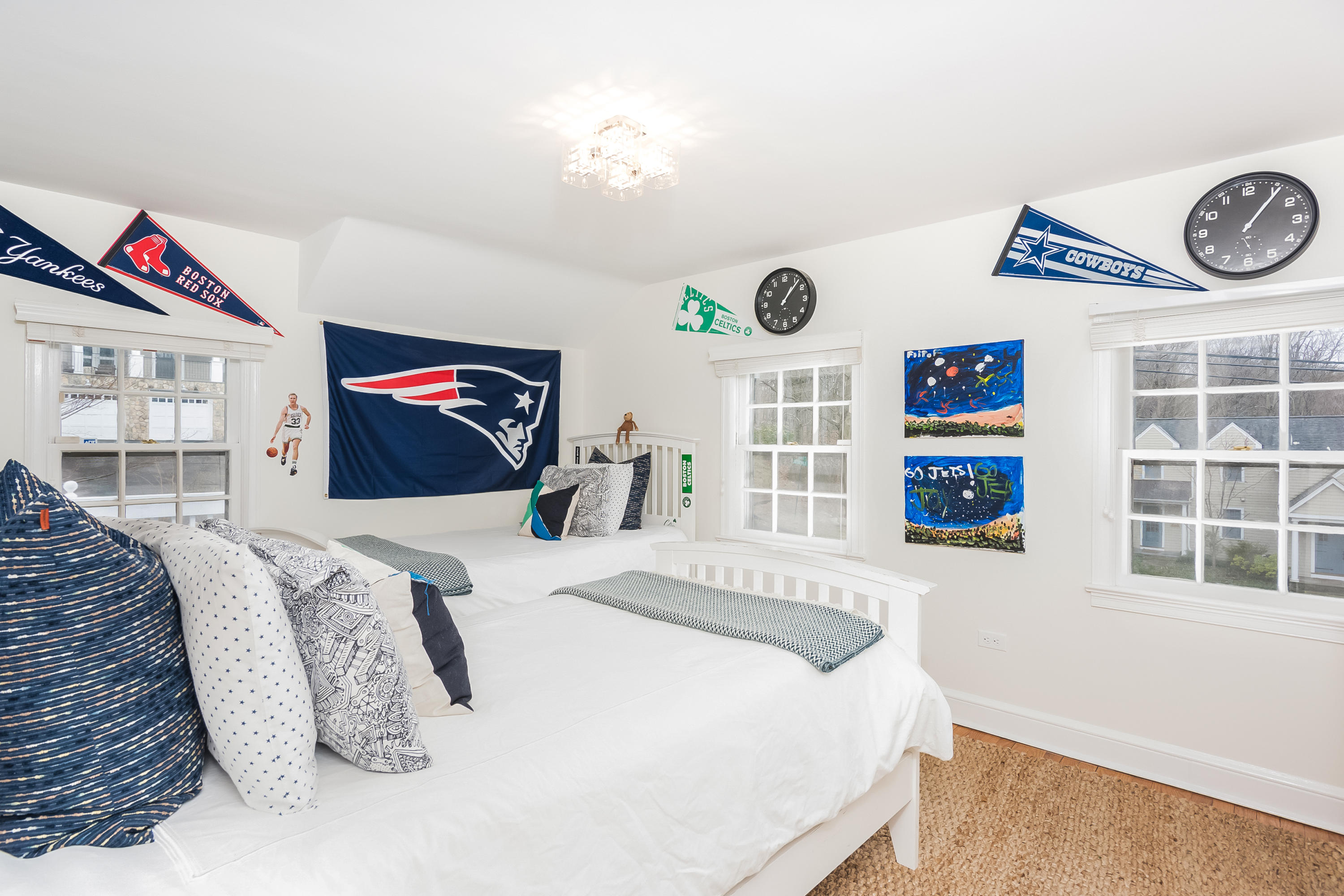 39 Intervale Road Darien, CT 06820 - Photo 9 of 18 a bed sitting in a bedroom next to a window